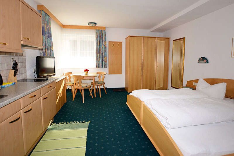 Apartment 5 with kitchen and double bed in the Ischglerblick apartment in Ischgl, Tyrol