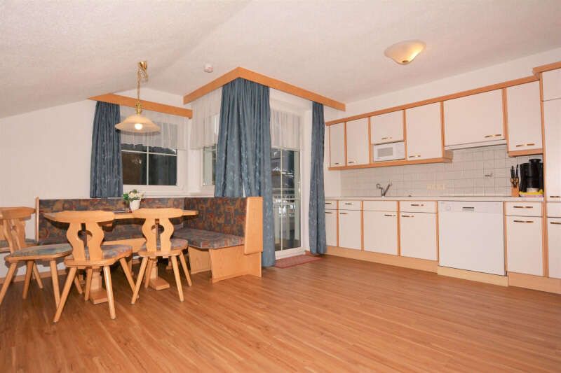 Apartment 4 with a living room including a kitchen in the Ischglerblick apartment in Ischgl, Tyrol