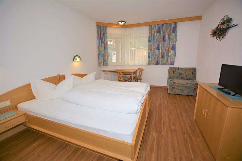 Apartment 1 with a double bed in the Ischglerblick apartment