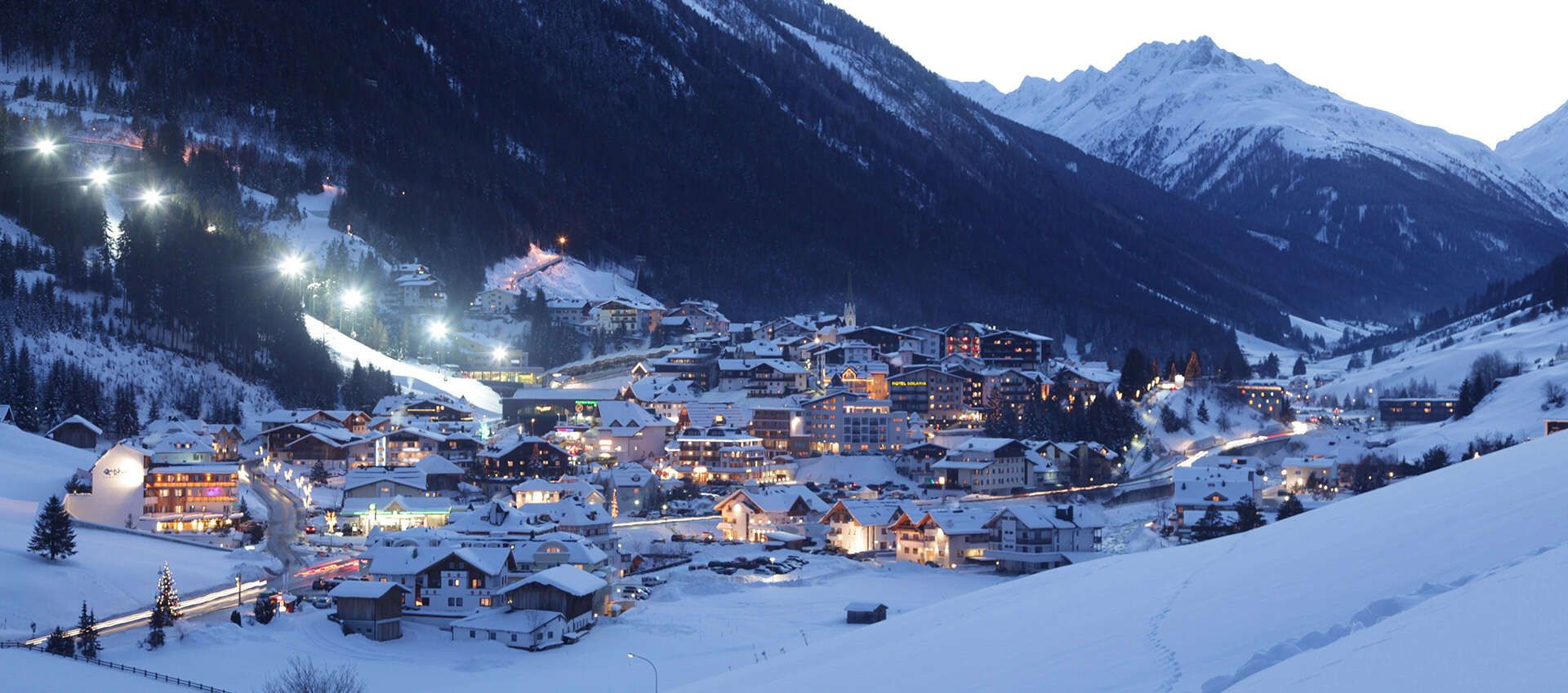 View of the town of Ischgl in winter at dusk